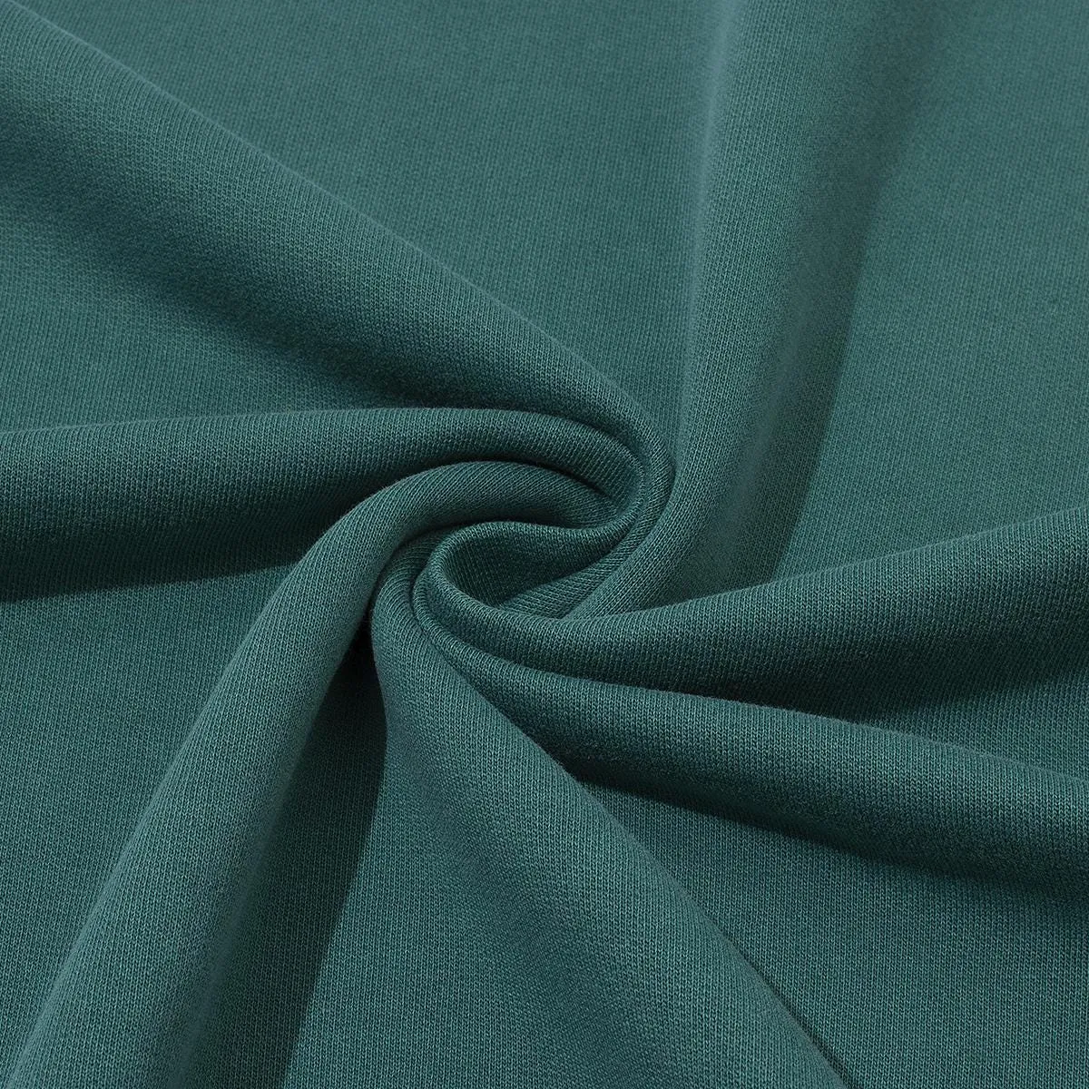 Supplier close-up of unprinted Wintergreen Dream cotton fabric for the 260 GSM T-shirt