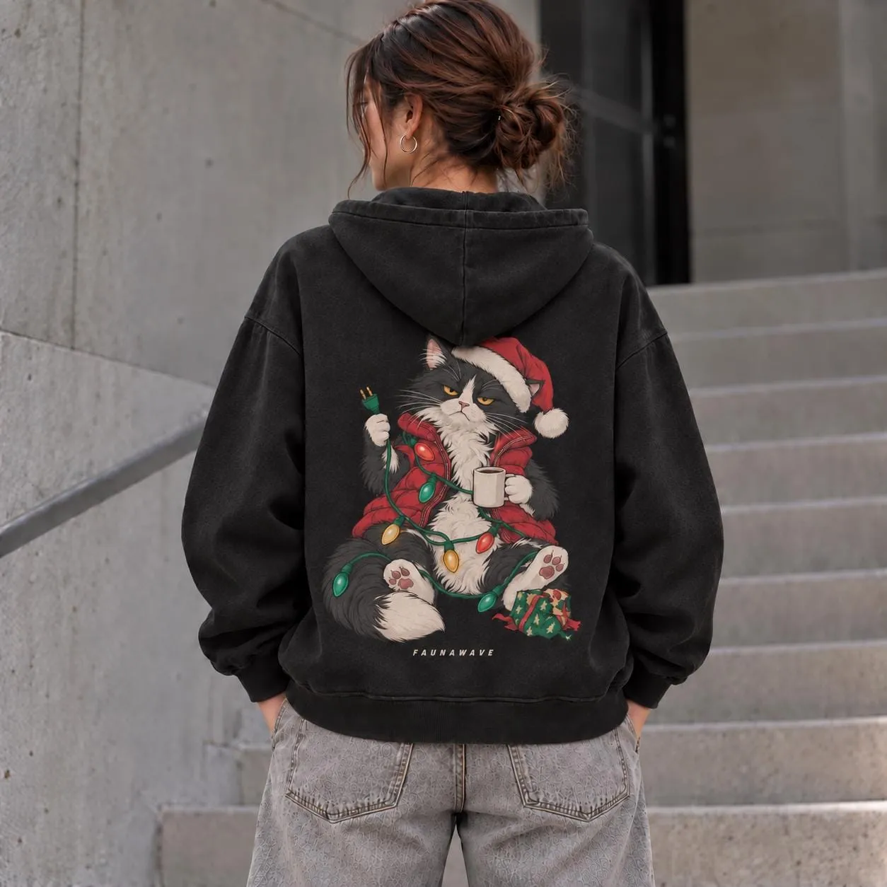 FAUNAWAVE grumpy Christmas cat: Female model wearing the oversized heavyweight cotton hoodie, back view; AI-generated illustrative mockup.