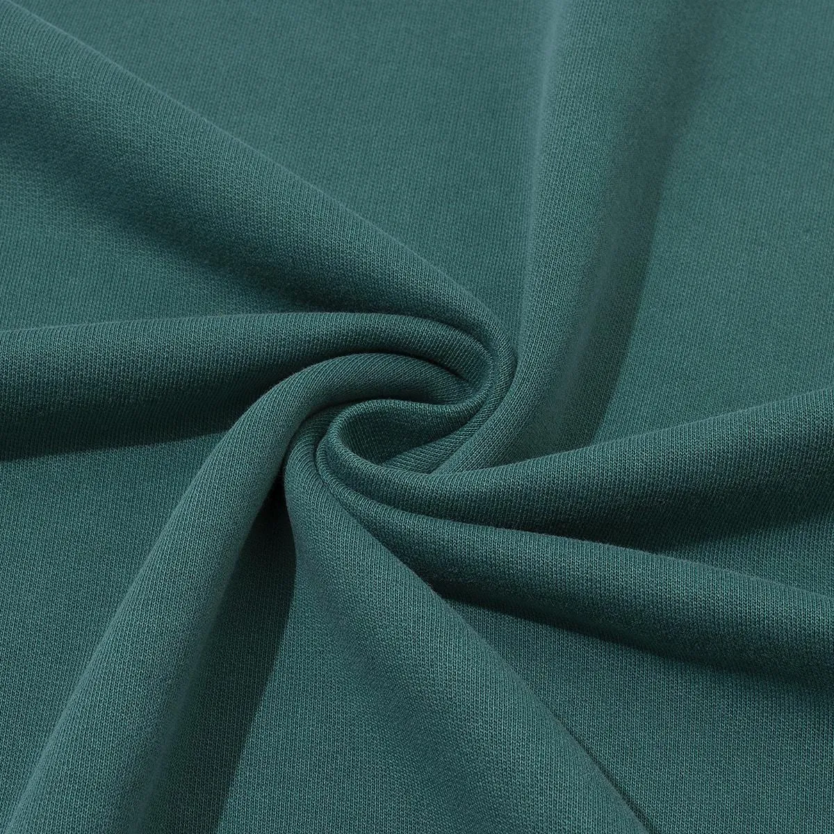 Supplier close-up of unprinted Wintergreen Dream cotton fabric for the 260 GSM T-shirt