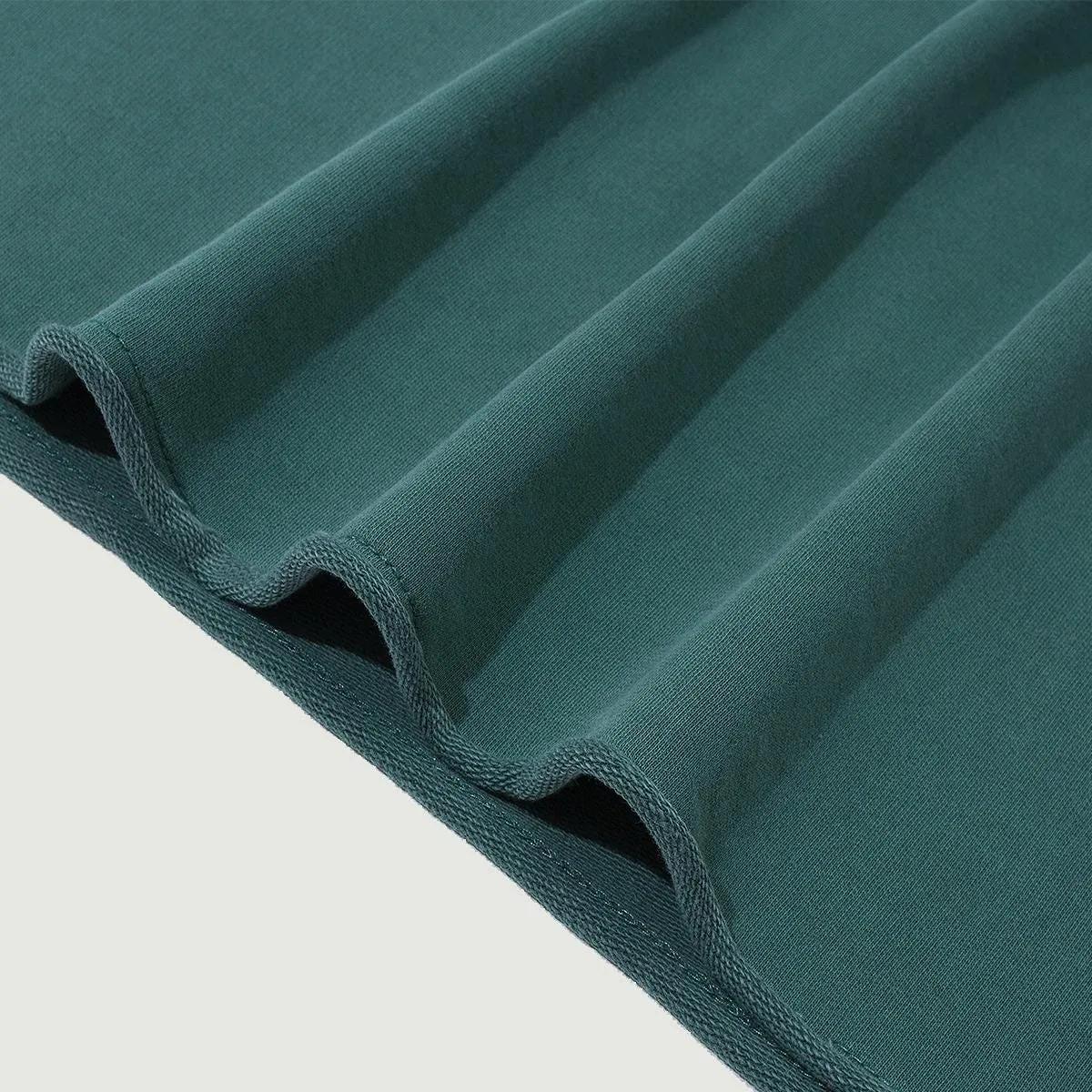 Supplier close-up of the raw edge hem in Wintergreen Dream