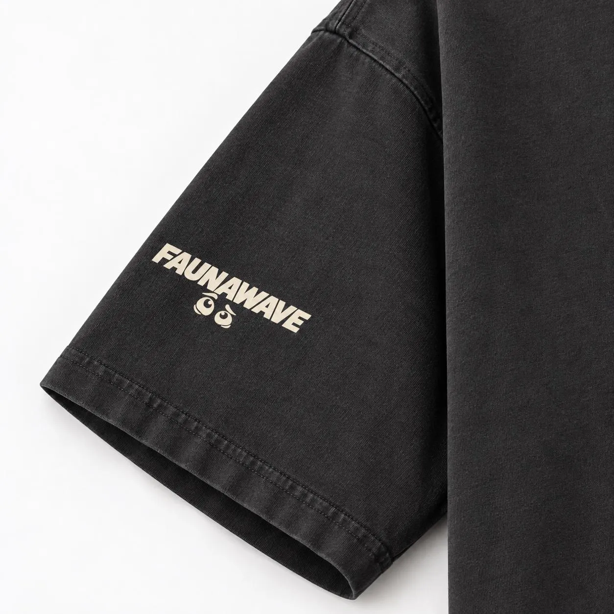 Close-up of the small Faunawave print on the duck T-shirt (illustrative mockup)