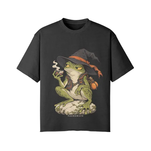 Halloween witch frog graphic T-shirt, frog in a witch hat holding a potion cup, Faded Black oversized faded tee, front print, flat lay